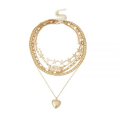 Elegant gold layered necklace with a heart pendant and textured chains.