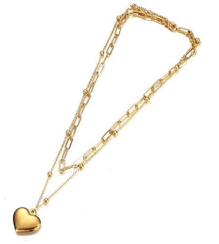 Detailed view of the dual-chain design on the gold heart charm necklace.