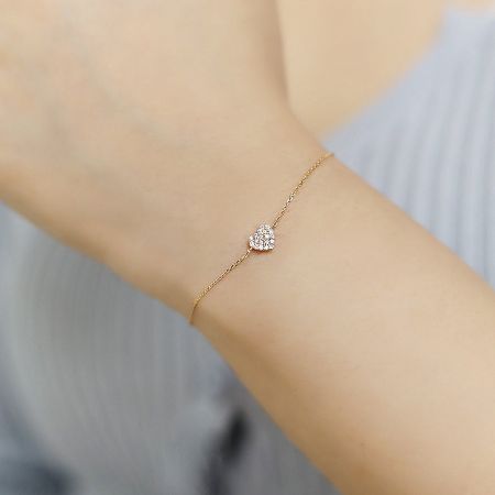 925 Sterling Silver Gold Pave CZ Heart Bracelets Set of 5 - A close-up of a 925 sterling silver bracelet with a gold-pave CZ heart charm, showcasing its intricate details and sparkle.