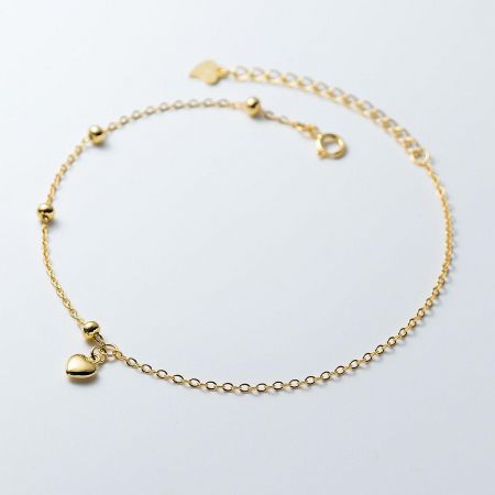 925 Silver 18K Gold Round Ball Bead Mini Heart Charm Bracelet - Set of 5 - A delicate 925 sterling silver bracelet plated in 18K gold, featuring a mini heart charm and round ball beads on a white background.
