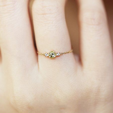 A delicate heart-shaped ring with a central stone, part of the 5-piece sterling silver set.