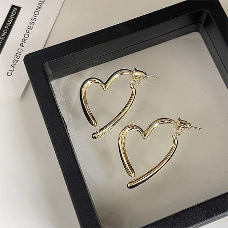 Elegant 14K gold-plated heart earrings displayed in a jewelry box.