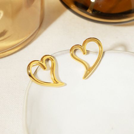Stainless Steel Tarnish-Free Gold Hollow Heart Stud Earrings (5 pairs) - A pair of gold-plated stainless steel hollow heart stud earrings on a clean white background, showcasing their polished finish and delicate design.