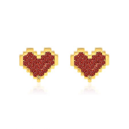 A pair of matching gold heart-shaped stud earrings with red gemstones.