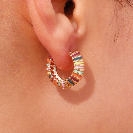 Side profile of the chunky hoop earring displaying the vibrant enamel color bands.