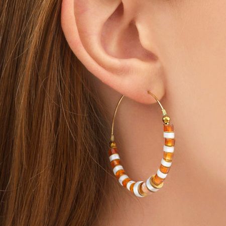 Stainless Steel Crystal Beaded Hoop Earrings (Set of 5 Pairs) - A detailed studio shot of a gold-plated stainless steel hoop earring featuring an elegant arrangement of white, orange, and translucent crystal beads.
