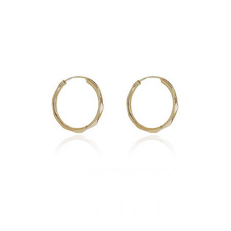 Detailed shot of the 28mm gold hoop earrings highlighting their textured surface.