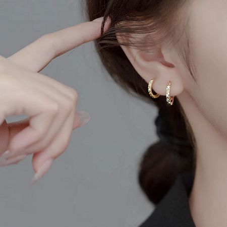 Elegant gold hoop earrings manufactured by JR Fashion Accessories.