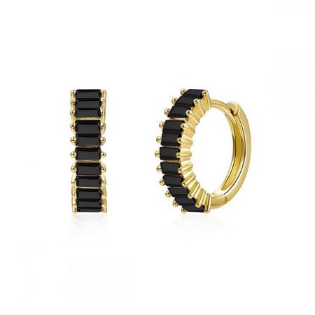 A pair of gold huggie hoop earrings featuring striking black baguette-cut cubic zirconia.