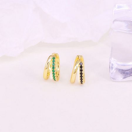 Close-up of the double-circle hoop earrings with green and black gemstone options.