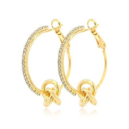 Crystal Love Knot Hoop Earrings - A close-up of the Crystal Love Knot Hoop Earrings, showing the intricate gold-plated knot design and sparkling white Czech crystal accents.