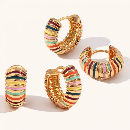 Front view of the stainless steel chunky hoop earrings with bright, multi-colored enamel design.