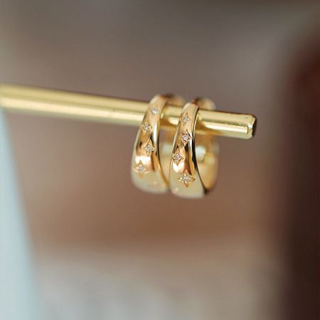 925 Silver Gold Star Zirconia Small Hoop Earrings (5 Pairs) - A pair of 925 sterling silver gold-plated hoop earrings featuring a star design with sparkling zirconia stones.