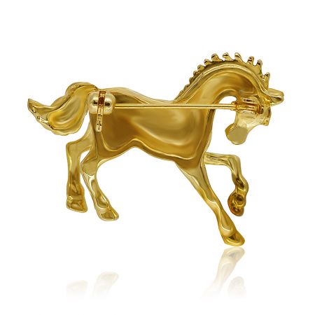 The back of the gold running horse brooch, showing the secure roller pin clasp and textured details.