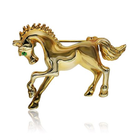 Gorgeous Emeralds Accent Running Horse Brooch - A detailed, gold-plated running horse brooch with a vibrant green emerald gemstone for an eye, showcasing its polished finish and dynamic design.