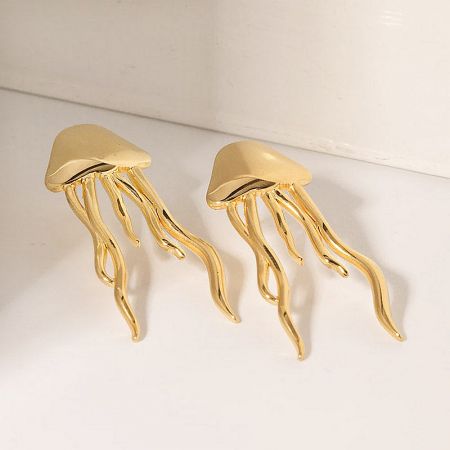Another angle of the polished gold jellyfish earrings, emphasizing their high-quality craftsmanship.