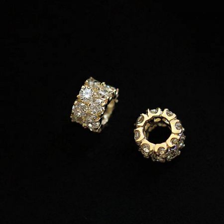 Detailed shot showcasing the craftsmanship of two zircon pendants from the sterling silver necklace set.