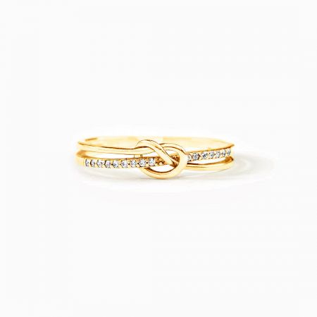 The Eternal Bond knot ring in a luxurious gold-plated finish with diamond accents.