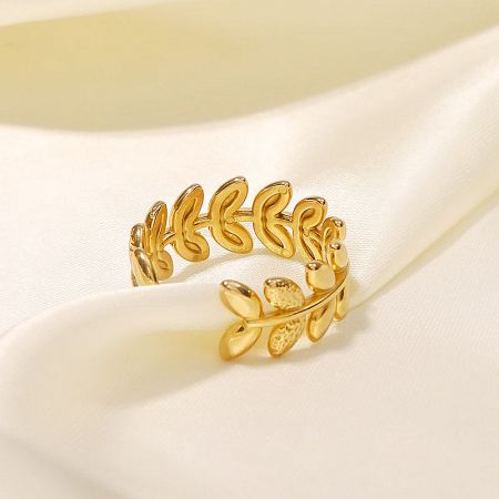 Front view of the adjustable stainless steel leaf ring with a gold finish.