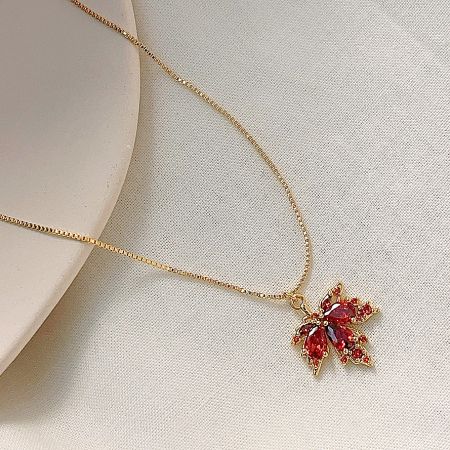 Gold Plated Red Zircon Crystal Maple Pendant Choker Necklaces Set of 5 - A stunning gold-plated choker necklace featuring a detailed maple leaf pendant set with brilliant red zircon crystals, on a clean white background.