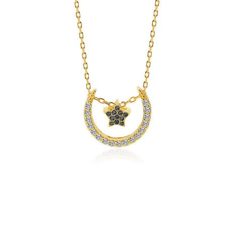 Close-up of the gold necklace with a crescent moon and star pendant, adorned with white and black cubic zirconia gemstones.