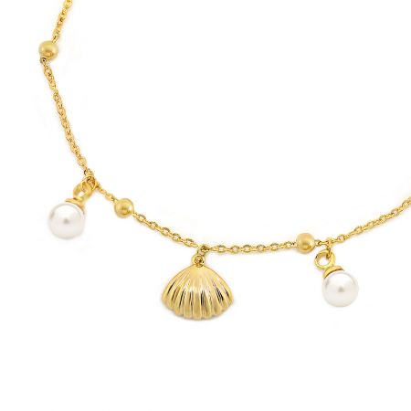 Matching gold necklace with a scallop shell pendant and white faux pearls, part of the beach-themed collection.