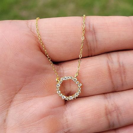 Angled shot of the 925 silver zircon wreath necklace, emphasizing its brilliant shine.