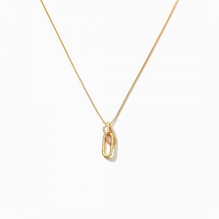 Another angle of the gold interlocking pendant necklace, highlighting its elegant design.