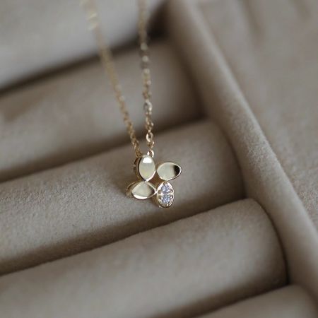 Lucky Four Leaf Flower Pendant Necklace 14K Gold Plated 925 Sterling Silver - Elegant lucky four-leaf flower pendant necklace in 14K gold plated 925 sterling silver, displayed in a jewelry box, featuring a sparkling cubic zirconia centerpiece.