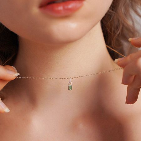 925 Sterling Silver Green Zircon Tiny Lock Pendant Necklace (Set of 5) - A model wearing the elegant 925 sterling silver necklace with a green zircon tiny lock pendant, showcasing its delicate design and gold finish.