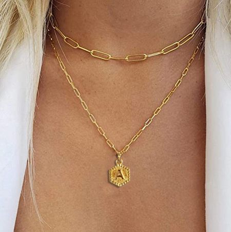 The custom initial necklace featuring a hexagonal pendant with the letter 'A', demonstrating the personalization options available.