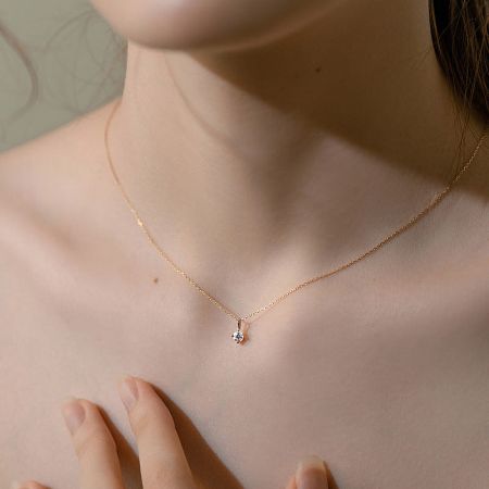 Full view of the elegant 45cm gold-finished solitaire pendant necklace.