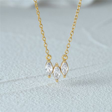 925 Sterling Silver Three Micro-Set Zircon Collar Necklace - A close-up of the 925 Sterling Silver Three Micro-Set Zircon Collar Necklace, showcasing the three sparkling gemstones on a gold-plated chain.