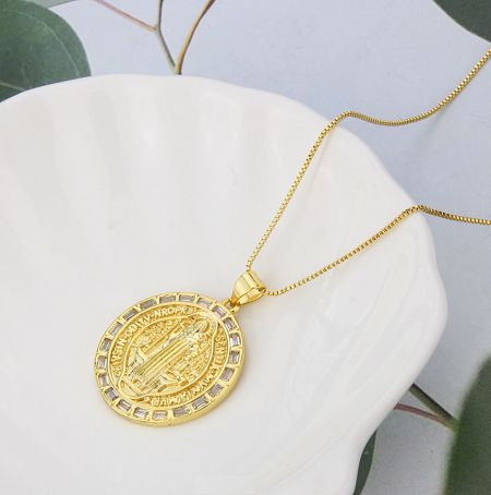 Custom Religious Faith Jewelry - Custom gold religious faith necklace featuring a detailed winged pendant, an example of custom jewelry by JR Fashion Accessories.