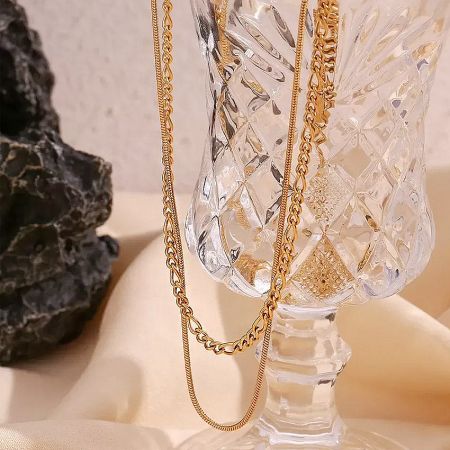Lifestyle shot of the double layered gold necklaces.