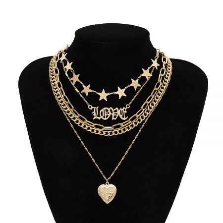 The multi-layer heart locket necklace elegantly displayed on a black velvet bust, showcasing its drape and style.