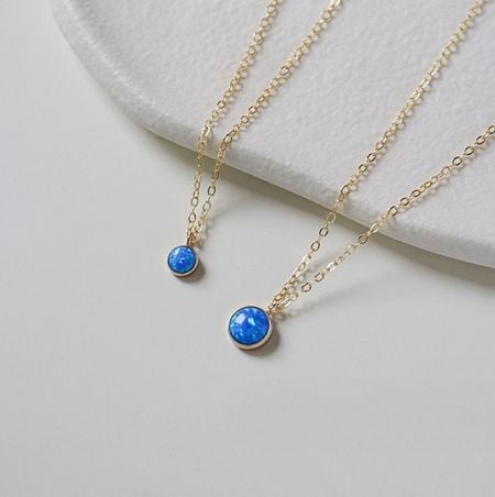 925 Sterling Silver Blue Lapis Necklace - Close-up of a 925 Sterling Silver Blue Lapis Necklace with gold plating, showcasing the vibrant blue stone and delicate chain on a white background.
