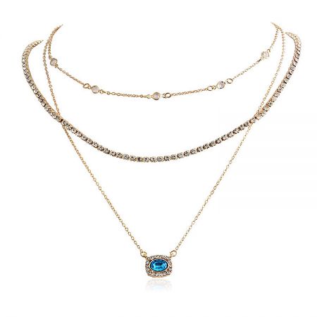 Custom Layered Necklace: Blue Gold Pendant Trio - A stunning three-layered gold necklace featuring blue and gold pendants with crystal accents, style JRN-024.