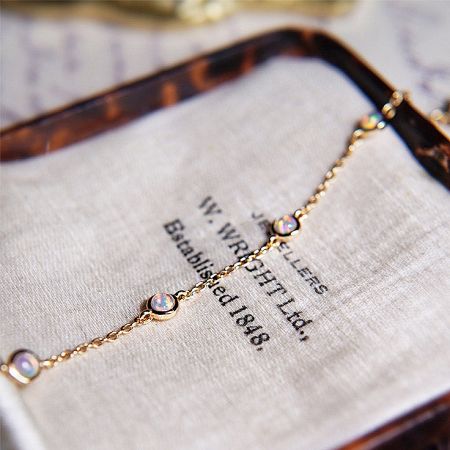 The 925 silver opal bracelet displayed in a luxurious JR Fashion Accessories jewelry box.