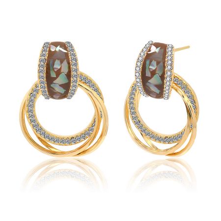 Detailed shot of the double-layered hoop design on the brown shell print enamel earrings.