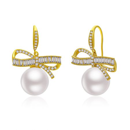 Detailed close-up of the CZ Ribbon Pearl Earrings, showing the craftsmanship of the gemstone settings and the quality of the pearl.