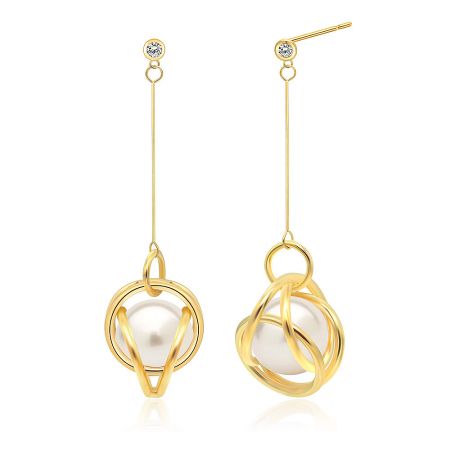 Close-up detail of the Gold-toned Swirled Filigree Pearl Earrings, focusing on the clear gemstones and abstract filigree pattern.