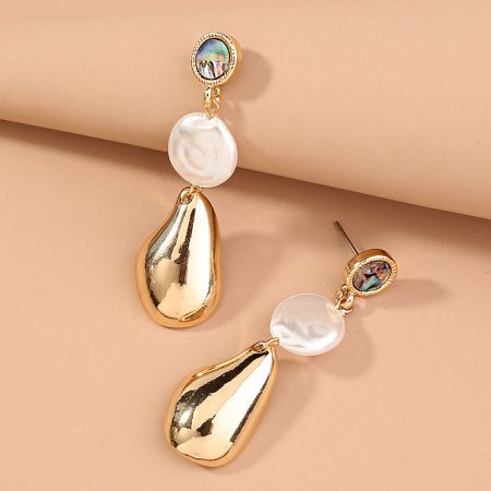 Side view of the irregular baroque pearl earrings showing the gold, pearl, and iridescent stone composition.
