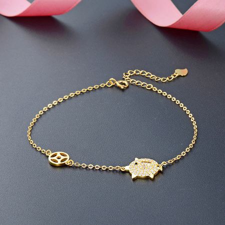 925 Sterling Silver Gold Plated Pave Zircon Pig Charm Bracelets (Set of 5) - A close-up of a 925 sterling silver gold-plated bracelet featuring a delicate pig charm adorned with pave-set zircon stones.