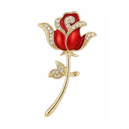 Luxurious gold-plated red enamel rose brooch with shimmering diamond accents.