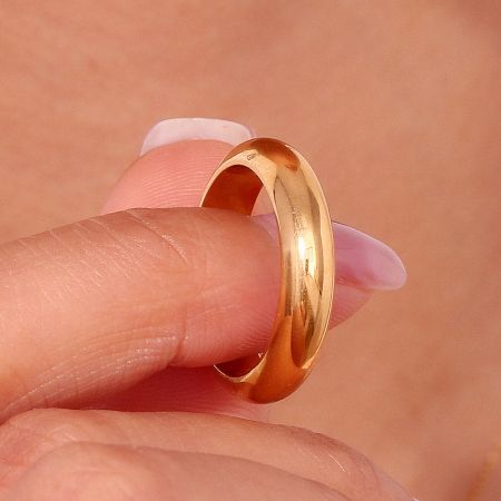 Detailed view of the 5mm thick gold stainless steel ring.