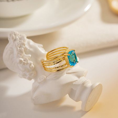 Promotional shot of the blue rectangle zirconia ring against a neutral background.