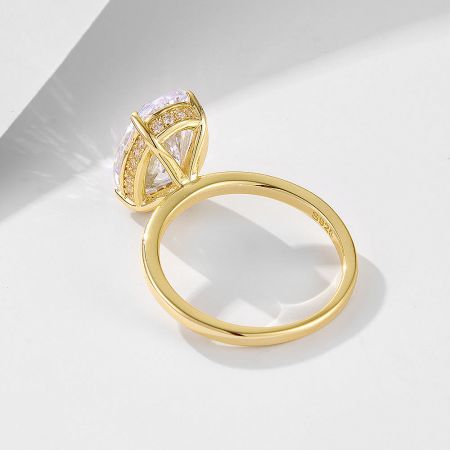 Side view of the engagement ring showing the S925 sterling silver stamp.