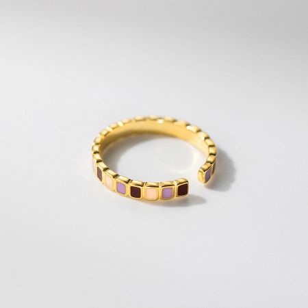 Top-down view of the gold-plated sterling silver ring, highlighting the minimalist geometric color-block design.