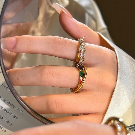 Fashionable brass ring with vibrant multicolored stones, perfect for boutique collections.